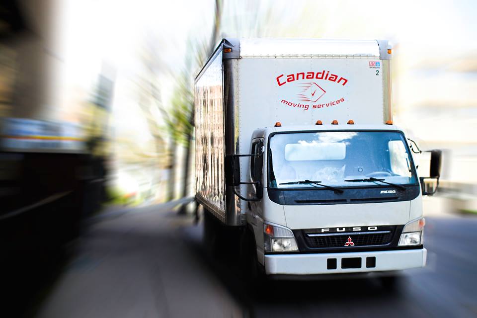 Canadian moving service white truck